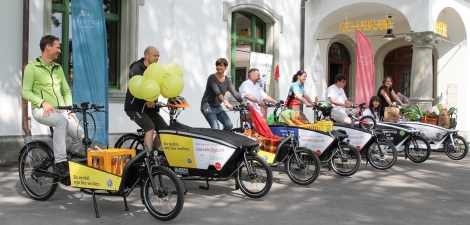 Group of people on e-cargo bikes